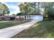 Ranch style home with brick facade and carport at 1396 Gale Dr, Norcross, GA 30093