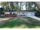 Brick ranch home with a spacious yard at 1396 Gale Dr, Norcross, GA 30093