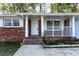Front porch with white columns and railing at 1396 Gale Dr, Norcross, GA 30093