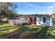 Brick house with a large deck and backyard at 1396 Gale Dr, Norcross, GA 30093
