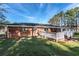Ranch house with a deck and large backyard at 1396 Gale Dr, Norcross, GA 30093