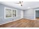 Bright living room with wood-look floors and neutral walls at 1396 Gale Dr, Norcross, GA 30093