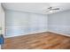 Living room with wood-look floors and wainscoting at 1396 Gale Dr, Norcross, GA 30093