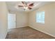 Well-lit bedroom with carpet, ceiling fan and window with blinds at 3464 Linecrest Rd, Ellenwood, GA 30294