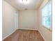 Cozy bedroom with neutral walls, carpet, and window with blinds at 3464 Linecrest Rd, Ellenwood, GA 30294