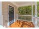 Gray front door with glass panels and keyless entry at 3464 Linecrest Rd, Ellenwood, GA 30294