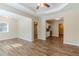 Open concept living room and kitchen with hardwood floors at 3464 Linecrest Rd, Ellenwood, GA 30294
