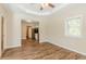 Open living room with kitchen view and coffered ceiling at 3464 Linecrest Rd, Ellenwood, GA 30294