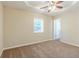 Spacious main bedroom with ceiling fan, carpet, and access to a private bathroom at 3464 Linecrest Rd, Ellenwood, GA 30294