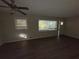 Spacious living room featuring hardwood floors and large windows at 214 Thornton Sw St, Atlanta, GA 30315