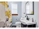 Well-appointed bathroom with a new vanity and shower at 3220 Dogwood Dr, Hapeville, GA 30354