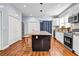 Updated kitchen featuring granite countertops and an island at 3220 Dogwood Dr, Hapeville, GA 30354