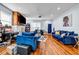 Spacious living room with hardwood floors, comfortable seating, and a fireplace at 3220 Dogwood Dr, Hapeville, GA 30354