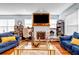 Bright living room featuring hardwood floors and a fireplace at 3220 Dogwood Dr, Hapeville, GA 30354
