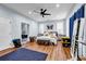 Spacious main bedroom with hardwood floors and en-suite bathroom at 3220 Dogwood Dr, Hapeville, GA 30354