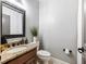 Basement bathroom with granite vanity and white cabinets at 3616 Bogan Springs Dr, Buford, GA 30519