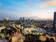 Aerial view showcasing the surrounding cityscape at dusk at 3630 Peachtree Ne Rd # 2305, Atlanta, GA 30326