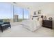 Bright bedroom with floor to ceiling windows and city views at 3630 Peachtree Ne Rd # 2305, Atlanta, GA 30326