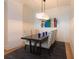 Elegant dining room with modern chandelier and seating for six at 3630 Peachtree Ne Rd # 2305, Atlanta, GA 30326