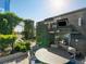 Relaxing rooftop patio with fireplace, seating area, and city views at 3630 Peachtree Ne Rd # 2305, Atlanta, GA 30326