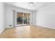 Bright Gathering room featuring tile floors and sliding glass doors to a screened porch at 4606 Greensprings Rd, College Park, GA 30337