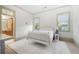 Bright bedroom with a white metal bed frame and ample natural light at 61 Alden Nw Ave, Atlanta, GA 30309