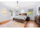 Bright bedroom with hardwood floors and large windows at 61 Alden Nw Ave, Atlanta, GA 30309