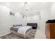 Basement bedroom with built-in shelving and a sofa at 61 Alden Nw Ave, Atlanta, GA 30309