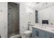 Modern bathroom with a walk-in shower and stylish vanity at 61 Alden Nw Ave, Atlanta, GA 30309