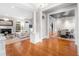 Spacious living and dining room with hardwood floors and a fireplace at 61 Alden Nw Ave, Atlanta, GA 30309