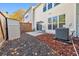 Private backyard with patio and exterior access at 247 Kigian Trl, Woodstock, GA 30188