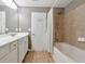 Bathroom with shower/tub combo and updated fixtures at 247 Kigian Trl, Woodstock, GA 30188