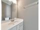 Well-appointed bathroom with single sink vanity and updated fixtures at 247 Kigian Trl, Woodstock, GA 30188