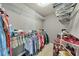 Large walk-in closet with ample shelving and hanging space at 247 Kigian Trl, Woodstock, GA 30188