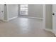 Simple bedroom with tile floors and neutral walls at 3 Rue Fontaine, Lithonia, GA 30038