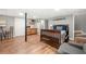 Finished basement bedroom with kitchenette and hardwood floors at 6650 Queen Mill Se Rd, Mableton, GA 30126