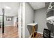Basement closet with ironing board and shelving at 6650 Queen Mill Se Rd, Mableton, GA 30126