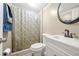 Clean basement bathroom with shower stall, toilet and vanity at 6650 Queen Mill Se Rd, Mableton, GA 30126