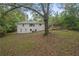 Ranch style home with a large backyard and mature trees at 6650 Queen Mill Se Rd, Mableton, GA 30126
