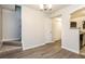Dining room features hardwood floors and an open concept design at 417 Tina Hely Ct, Stockbridge, GA 30281