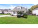 Charming one-story house with a well-manicured lawn and front porch at 417 Tina Hely Ct, Stockbridge, GA 30281