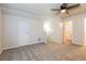 Large main bedroom with wall-to-wall carpet and ceiling fan at 417 Tina Hely Ct, Stockbridge, GA 30281