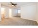 Main bedroom with carpet flooring and ensuite bathroom access at 417 Tina Hely Ct, Stockbridge, GA 30281