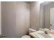 Clean bathroom with single sink and toilet at 4480 Joseph Dr, Snellville, GA 30039