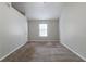 Simple bedroom with carpet and neutral walls at 4480 Joseph Dr, Snellville, GA 30039