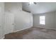 Spacious bedroom with neutral walls and carpet at 4480 Joseph Dr, Snellville, GA 30039