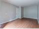 Hardwood floor bedroom with door and window at 4480 Joseph Dr, Snellville, GA 30039