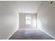 Simple bedroom with a window and carpet at 4480 Joseph Dr, Snellville, GA 30039