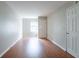 Spacious bedroom with hardwood floors and window at 4480 Joseph Dr, Snellville, GA 30039