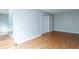 Simple bedroom with hardwood floors and a double door closet at 4480 Joseph Dr, Snellville, GA 30039